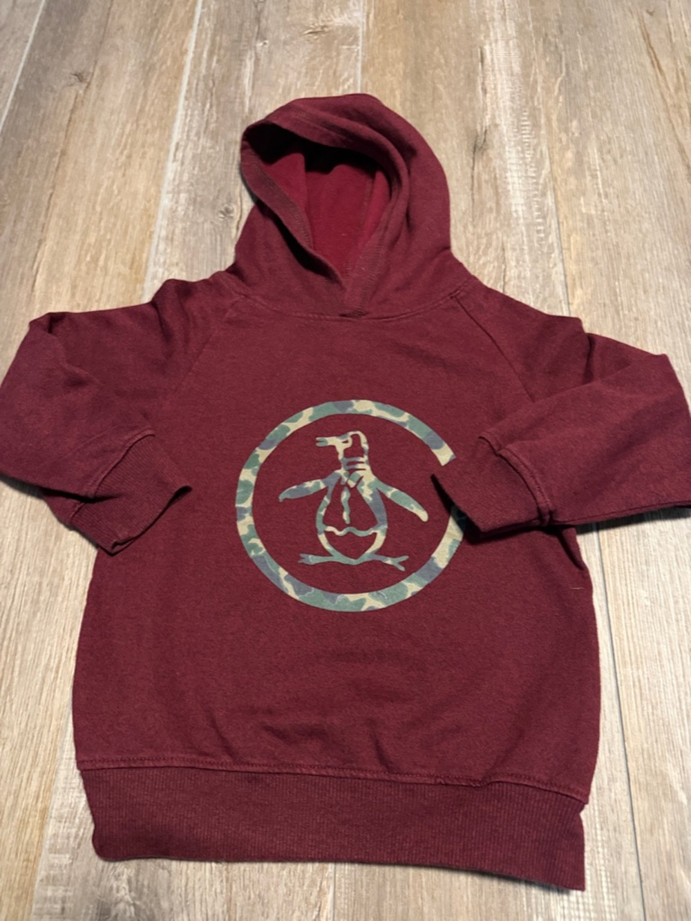 Original Penguin
Burgundy Hoodie with Camo Penguin Graphic